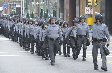 Pennsylvania State Troopers patrol on a street in Pittsburgh, Pennsylvania, the United States, September 24, 2004. The G20 Summit is to be held on Spetember 24 and 25.