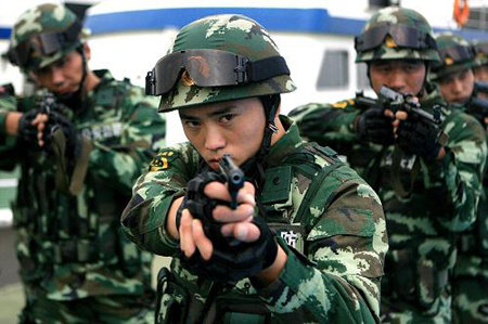 An anti-terror drill for the upcoming National Day is held in Shanghai, September 24.