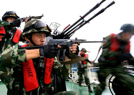 An anti-terror drill for the upcoming National Day is held in Shanghai, September 24. 