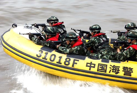 An anti-terror drill for the upcoming National Day is held in Shanghai, September 24.