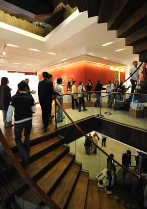 People visit the exhibition titled 'Footstone, the 60 years past' in Beijing, capital of China, September 26, 2009.