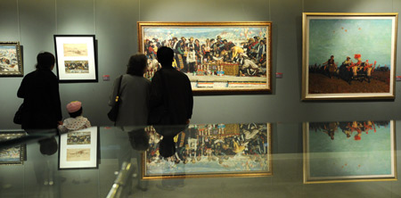 People visit the exhibition titled 'Footstone, the 60 years past' in Beijing, capital of China, September 26, 2009.