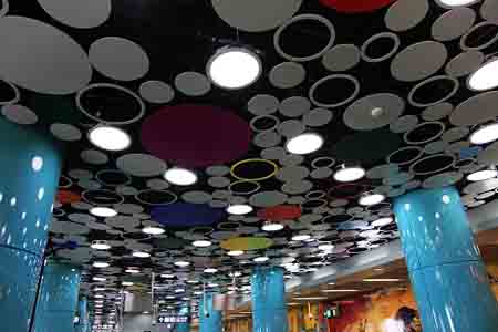 The Beijing Zoo station's ceiling is full of abstract balloons.