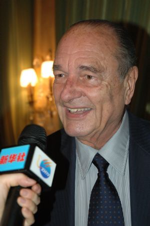 Former French President Jacques Chirac is interviewed during a reception held at a garden in Paris, capital of France, on September 28, 2009.