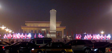 This picture taken on September 28, 2009 shows Tiananmen Square is illuminated by two large LED screens. With the coming of the National Day of China, the nights of Beijing become more charming with many places and buildings illuminated by lights. 