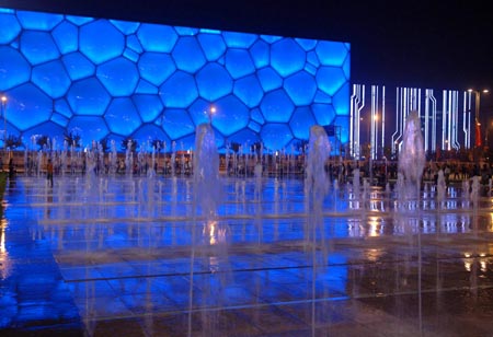 This picture taken on September 28, 2009 shows the beautiful Water Cube at night. With the coming of the National Day of China, the nights of Beijing become more charming with many places and buildings illuminated by lights.