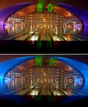 This combo picture taken on September 28, 2009 shows that 'Sixty' (upper) and 'National Day' composed of lights are seen on the National Center for the Performing Arts at night. With the coming of the National Day of China, the nights of Beijing become more charming with many places and buildings illuminated by lights. 