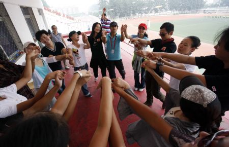 Photo taken on August 26, 2009 shows some directors and staff members rehearse for an evening party marking the 60th anniversary of the founding of the People&apos;s Republic of China, in Beijing. China&apos;s capital Beijing is ready for an array of celebrations including a parade and an evening party marking the 60th anniversary of the founding of the People&apos;s Republic of China, which falls on October 1. 