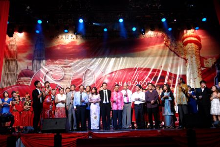 Chinese students studying in Malaysia hold a soiree to celebrate the 60th anniversary of the founding of the People's Republic of China, in Kuala Lumpur, Malaysia, on September 29, 2009.