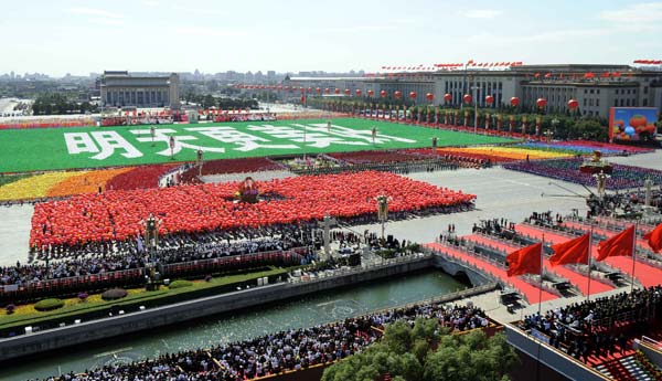The background phalanxes form Chinese characters meaning 'A Bright Future' during the celebrations for the 60th anniversary of the founding of the People's Republic of China, in central Beijing, capital of China, October 1, 2009.