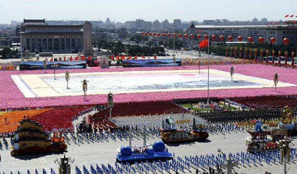 The background phalanxes form the image of a Chinese painting depicting the landscapes of China, during the celebrations for the 60th anniversary of the founding of the People's Republic of China, in central Beijing, capital of China, October 1, 2009.