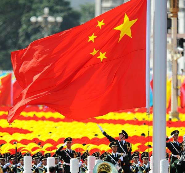 The national flag-raising ceremony is held at the start of the celebrations for the 60th anniversary of the founding of the People&apos;s Republic of China, on the Tian&apos;anmen Square in central Beijing, capital of China, October 1, 2009.