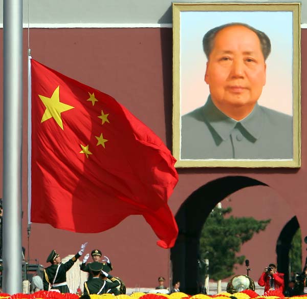 The national flag-raising ceremony is held at the start of the celebrations for the 60th anniversary of the founding of the People&apos;s Republic of China, on the Tian&apos;anmen Square in central Beijing, capital of China, October 1, 2009.