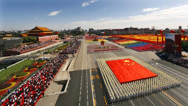 The phalanx of national flag receives inspection in a parade of the celebrations for the 60th anniversary of the founding of the People&apos;s Republic of China, on Chang&apos;an Avenue in central Beijing, capital of China, October 1, 2009.