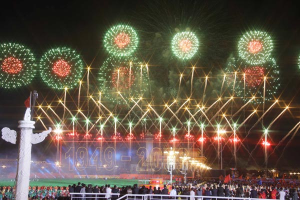 Photo taken through the starburst lens shows fireworks over the Tian'anmen Square during the celebrations for the 60th anniversary of the founding of the People's Republic of China, in Beijing, capital of China, October 1, 2009.