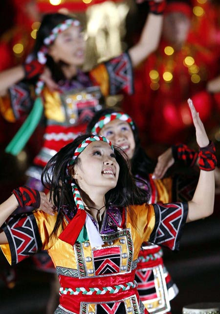 Performers dance during a grand gala celebrating the 60th anniversary of the founding of the People&apos;s Republic of China, on the Tian&apos;anmen square in Beijing, capital of China, October 1, 2009.