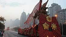A float arrives at Chang'an avenue in the early morning in Beijing, on October 1, 2009. China will celebrate on October 1 the 60th anniversary of the founding of the People's Republic of China.