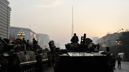 Soldiers get ready for the parade of the celebrations for the 60th anniversary of the founding of the People's Republic of China, in Beijing, Oct. 1, 2009. (Xinhua/Yang Guang)