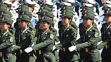 Female soldiers of the three services of the Chinese People's Liberation Army march in a parade of the celebrations for the 60th anniversary of the founding of the People's Republic of China, in central Beijing, capital of China, October 1, 2009.