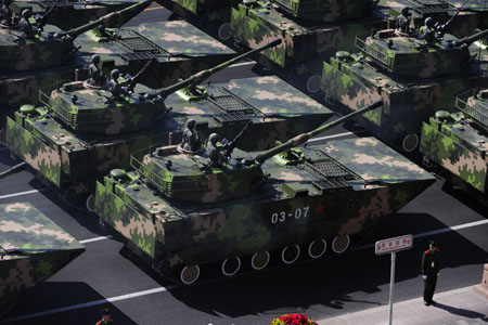 Amphibious assault vehicles take part in a parade of the celebrations for the 60th anniversary of the founding of the People's Republic of China, on Chang'an Street in central Beijing, capital of China, Oct. 1, 2009. (Xinhua/Yang Guang)