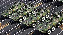 Wheeled infantry vehicles take part in a parade of the celebrations for the 60th anniversary of the founding of the People's Republic of China, on Chang'an Street in central Beijing, capital of China, October 1, 2009.