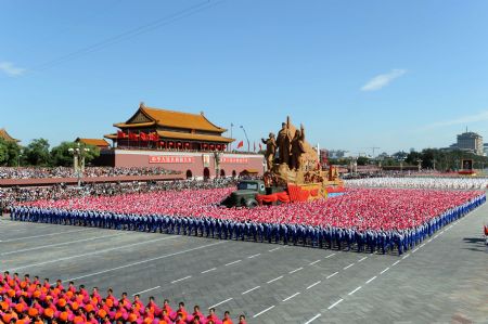 A float takes part in a parade of the celebrations for the 60th anniversary of the founding of the People&apos;s Republic of China, on Chang&apos;an Avenue in central Beijing, capital of China, Oct. 1, 2009. (Xinhua/Zhao Peng)