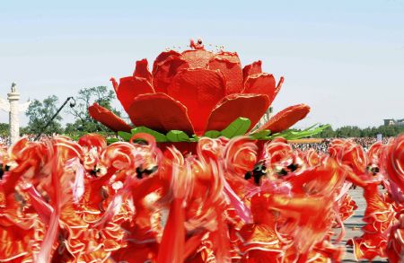 A grand performance is staged in the celebrations for the 60th anniversary of the founding of the People&apos;s Republic of China, on the Tian&apos;anmen Square in central Beijing, capital of China, Oct. 1, 2009. (Xinhua/Li Tao)