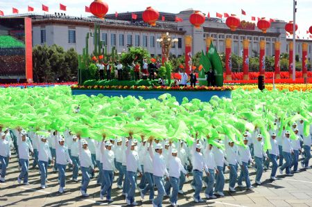 A float featuring "environmental protection" takes part in a parade of the celebrations for the 60th anniversary of the founding of the People