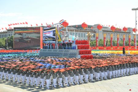 A float of science and technology takes part in a parade of the celebrations for the 60th anniversary of the founding of the People&apos;s Republic of China, on Chang&apos;an Street in central Beijing, capital of China, Oct. 1, 2009. (Xinhua/Li Xiaoguo)