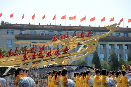 The float of south China&apos;s Guangdong Province takes part in a parade of the celebrations for the 60th anniversary of the founding of the People&apos;s Republic of China, on Chang&apos;an Street in central Beijing, capital of China, Oct. 1, 2009. (Xinhua/Xu Yu)