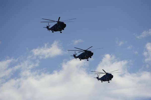 A formation of helicopters fly over the Tian&apos;anmen Square in the celebrations for the 60th anniversary of the founding of the People&apos;s Republic of China, in Beijing, capital of China, Oct. 1, 2009. (Xinhua/Yang Guang)