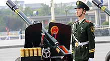 A soldier of the Chinese People's Armed Police Force is ready for the celebrations for the 60th anniversary of the founding of the People's Republic of China on the Tian'anmen Square in central Beijing, capital of China, October 1, 2009.