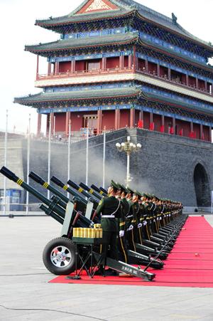 Soldiers of the Chinese People's Armed Police Force fire 60 gun salute at the start of the celebrations for the 60th anniversary of the founding of the People's Republic of China, near the Tian'anmen Square in central Beijing, capital of China, Oct. 1, 2009. (Xinhua/Ren Yong)