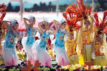 Performers take part in a parade of the celebrations for the 60th anniversary of the founding of the People&apos;s Republic of China, on Chang&apos;an Street in central Beijing, capital of China, Oct. 1, 2009. (Xinhua/Wang Jianhua) 