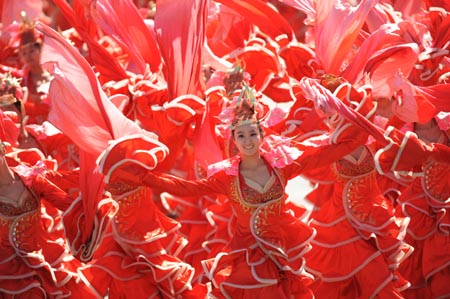 Performers take part in a parade of the celebrations for the 60th anniversary of the founding of the People&apos;s Republic of China, on Chang&apos;an Street in central Beijing, capital of China, Oct. 1, 2009. (Xinhua/Li Ga) 