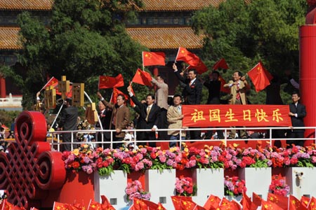 Parcitipants parade in the celebrations for the 60th anniversary of the founding of the People&apos;s Republic of China, on Chang&apos;an Street in central Beijing, capital of China, Oct. 1, 2009. (Xinhua/Wang Song)