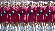 Militiawomen receive inspection in a parade of the celebrations for the 60th anniversary of the founding of the People's Republic of China, in central Beijing, capital of China, October 1, 2009.