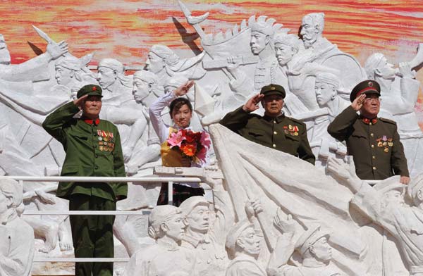 A float takes part in a parade of the celebrations for the 60th anniversary of the founding of the People's Republic of China, on Chang'an Avenue in central Beijing, capital of China, Oct. 1, 2009. (Xinhua/Li Wen)