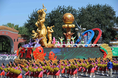 The float of northwest China&apos;s Ningxia Hui Autonomous Region, takes part in a parade of the celebrations for the 60th anniversary of the founding of the People&apos;s Republic of China, on Chang&apos;an Street in central Beijing, capital of China, Oct. 1, 2009. (Xinhua/Li Gang)