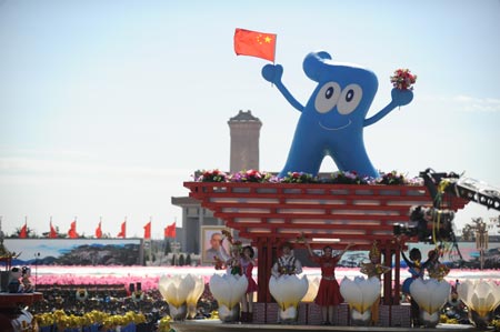 The float of east China&apos;s Shanghai takes part in a parade of the celebrations for the 60th anniversary of the founding of the People&apos;s Republic of China, in Beijing, capital of China, Oct. 1, 2009. (Xinhua/Li Gao)