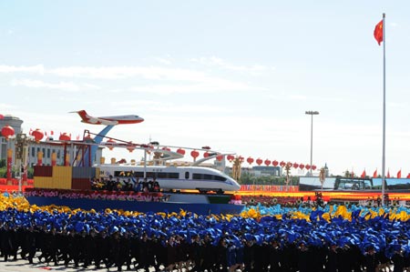 The theme float of transportation takes part in a parade of the celebrations for the 60th anniversary of the founding of the People&apos;s Republic of China, on Chang&apos;an Street in central Beijing, capital of China, Oct. 1, 2009. (Xinhua/Yang Lei)