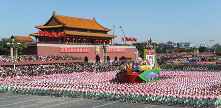 The float featuring health care takes part in a parade of the celebrations for the 60th anniversary of the founding of the People&apos;s Republic of China, in Beijing, capital of China, Oct. 1, 2009. (Xinhua/Chen Shugen)