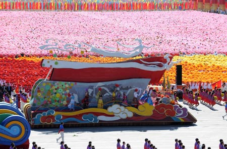 The float represents Gansu Province takes part in a parade of the celebrations for the 60th anniversary of the founding of the People&apos;s Republic of China, on Chang&apos;an Street in central Beijing, capital of China, Oct. 1, 2009. (Xinhua/Guo Dayue)