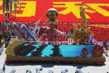 The float represents Ningxia Hui Autonomous Region takes part in a parade of the celebrations for the 60th anniversary of the founding of the People&apos;s Republic of China, on Chang&apos;an Street in central Beijing, capital of China, Oct. 1, 2009.(Xinhua/Guo Dayue)