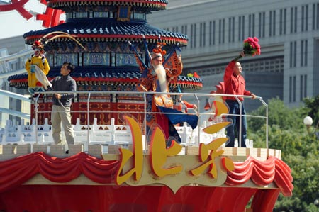 A float of Beijing takes part in a parade of the celebrations for the 60th anniversary of the founding of the People&apos;s Republic of China, on Chang&apos;an Street in central Beijing, capital of China, Oct. 1, 2009. (Xinhua/Guo Yong)