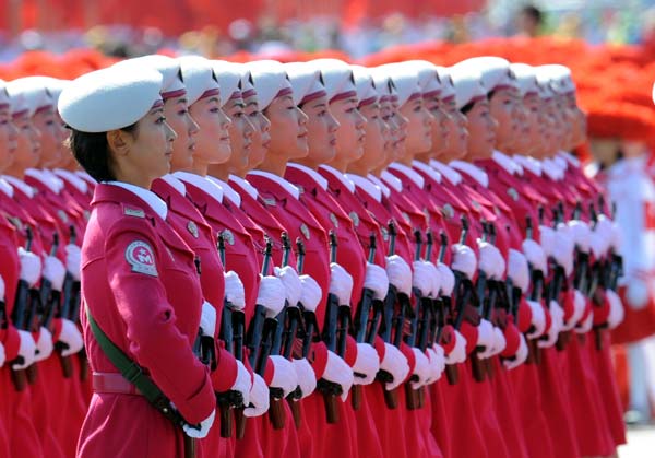 Militiawomen receive inspection in a parade of the celebrations for the 60th anniversary of the founding of the People's Republic of China, in central Beijing, capital of China, Oct. 1, 2009. (Xinhua/Yang Shiyao)