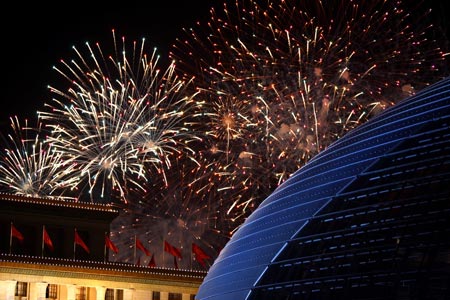 Fireworks explode over the Tian'anmen Square in central Beijing during a grand evening gala in the celebrations for the 60th anniversary of the founding of the People's Republic of China, October 1, 2009.