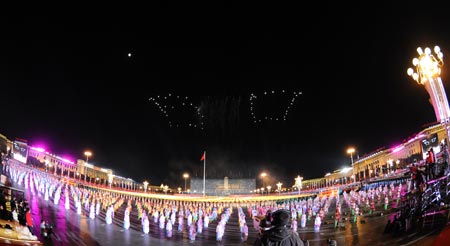 Fireworks form a figure 60 over Tian'anmen Square in the celebrations for the 60th anniversary of the founding of the People's Republic of China, in Beijing, capital of China, October 1, 2009. 