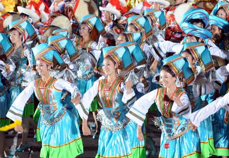 Dancers perform in the grand evening gala for the 60th anniversary of the founding of the People's Republic of China, on the Tian'anmen Square in central Beijing, capital of China, October 1, 2009. 