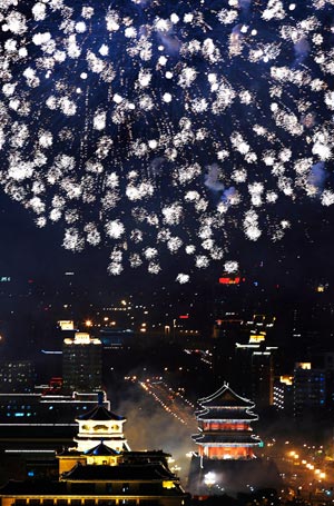 Fireworks are seen during the grand evening gala celebrating the 60th anniversary of the founding of the People's Republic of China, in Beijing, capital of China, October 1, 2009.